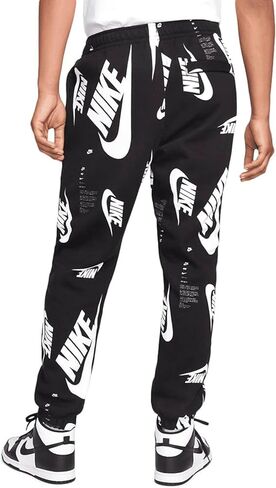 بنطال رياضي أسود من Nike للرجال Club+ AOP Swoosh Fleece (الولايات المتحدة، Alpha، XX-Large، عادي، عادي، قياسي، أسود/أبيض) in Saudi Arabia