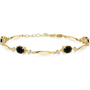 Gem Stone King 18K Yellow Gold Plated Silver Black Onyx and White Moissanite Tennis Bracelet For Women | 3.10 Cttw | Gemstone December Birthstone | Oval 7X5MM | 6 Inch + 1 Inch Extender