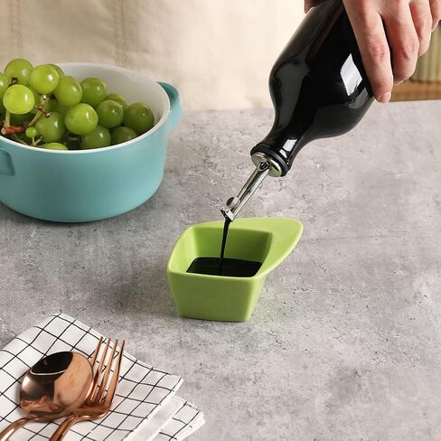Sweejar Ceramic Olive Oil Dispenser Bottle, 20 Oz Relief Opaque Oil Cruet Protects Oil To Reduce Oxidation, Suitable for Storage Oil, Vinegar, Soy Sauce, Coffee Syrup, Liquids, Pack of 1 (Black) in Kuwait
