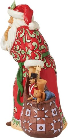 Enesco Jim Shore Heartwood Creek Santa with Toy Bag Shush Quiet Figurine- Stone Resin Hand Painted Crafted Collectible Santa Figurines Christmas Home Decor Statue, 8.46 Inch in Saudi Arabia