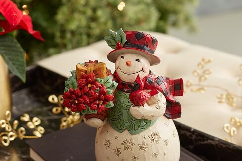 Enesco Jim Shore Heartwood Creek Highland Glen رجل ثلج مع تمثال سلة البونسيتة - راتنج حجري مطلي يدويًا مصنوع يدويًا تمثال رجل ثلج قابل للتجميع، تمثال ديكور منزلي لعيد الميلاد، 7.28 بوصة in Saudi Arabia