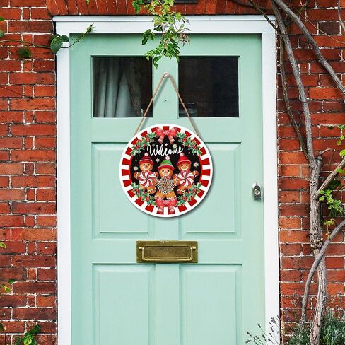 Anyako Christmas Gingerbread Man Welcome Door Sign For Front Door Decor,Red White Stripes Holly Berry Wooden Sign 12"x 12" Round Wood Hanging Door Sign Christmas Decoration for Wall Rusti Decor in Saudi Arabia