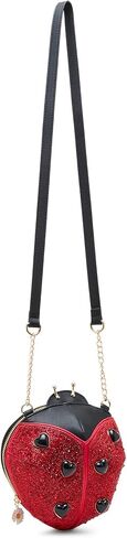 سيدة بيتسي جونسون في Crossbody الأحمر in Saudi Arabia
