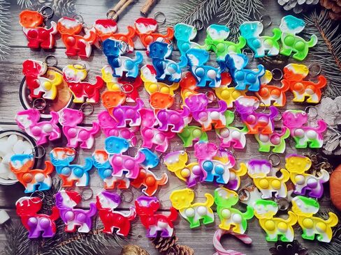 100 Packs Bulk Dog Puppy Backpack Keychain Decor Rainbow Mini pop Fidget for Students Gifts and Dog Party Favors,Students Bubble Prize for Kids in Saudi Arabia