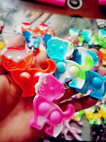 100 Packs Bulk Dog Puppy Backpack Keychain Decor Rainbow Mini pop Fidget for Students Gifts and Dog Party Favors,Students Bubble Prize for Kids in Saudi Arabia