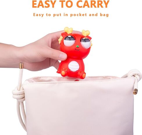 Squeezy Dragon Pop Out Eyes Toys, Eye Popping Dragon Stress Relief Toy for Christmas Birthday Gift Party Favors in Saudi Arabia
