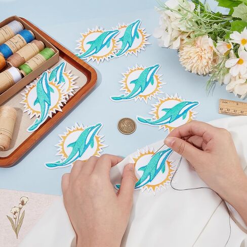 12 Pcs Dolphin Cloth Patches, Turquoise Dolphin Iron On Sew On Embroidered Patch Animal Cloth Patches for Hats Jackets Backpacks Jeans and Clothes Badge DIY Applique in Saudi Arabia