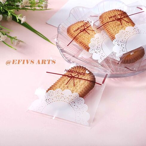 200pcs 5.5x5.5in Lovely Lace Bowknot Clear Biscuit Roasting Treat Present DIY Plastic Candy Individual Wrappers Self Adhesive OPP Cookie Bakery Decorating Favor Bags in Saudi Arabia