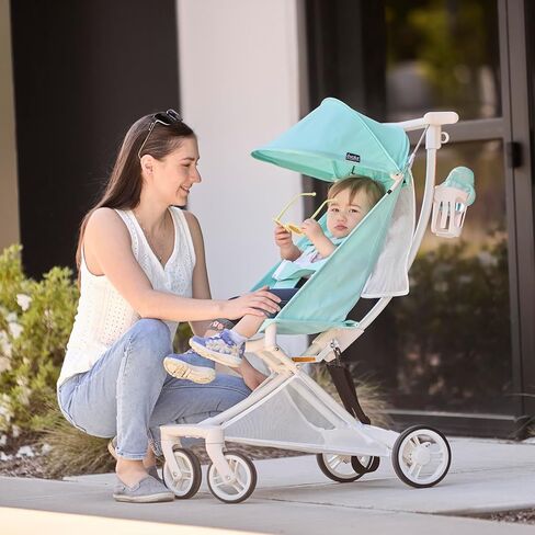 عربة أطفال بمظلة خفيفة للغاية من Evolur Roamer باللون الأبيض والأزرق، عربة سفر سريعة وسهلة الطي بيد واحدة، حزام أمان بخمس نقاط، مظلة قابلة للتعديل والإزالة، عربة أطفال بإطار من الألومنيوم خفيف الوزن in Kuwait