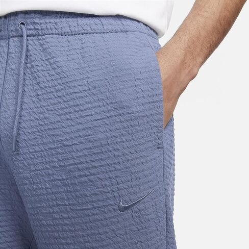 بنطال يوجا Dri-FIT للرجال من نايك (أزرق منتشر/أزرق منتشر، DV9885-491) in Saudi Arabia