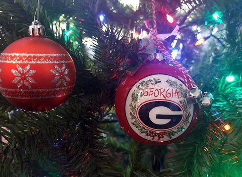 University of Georgia Bulldogs Ceramic Ball Ornament - Team Logo & Kick Off Design w/Ribbon & Bells by Magnolia Lane - Christmas Decoration, Gift for UGA Students, Alumni - for Home, Dorm Decor in Saudi Arabia