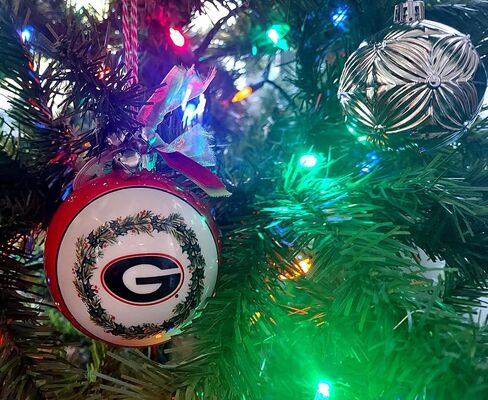 University of Georgia Bulldogs Ceramic Ball Ornament - Team Logo & Kick Off Design w/Ribbon & Bells by Magnolia Lane - Christmas Decoration, Gift for UGA Students, Alumni - for Home, Dorm Decor in Saudi Arabia