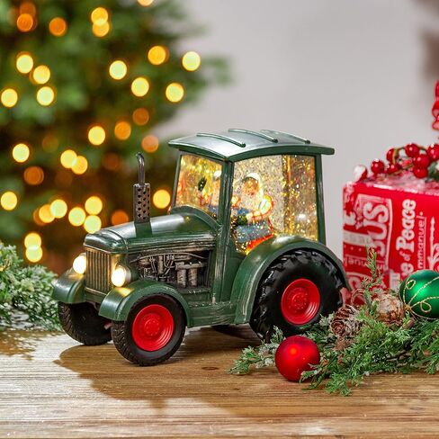 8.75-Inch Long Battery-Operated Spinning Water Globe Tractor with Santa, and a Timer Feature in Kuwait
