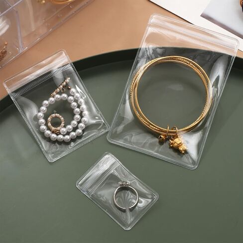Acrylic Jewelry Box Organizer with 50 Portable Anti Tarnish Jewelry Bags, Clear Jewelry Organizers and Storage, Travel Jewelry Case Organizers for Earrings Rings Necklaces for Women Girls in Saudi Arabia