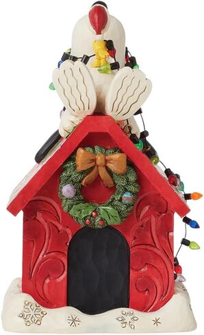 Enesco Peanuts by Jim Shore Snoopy's Dog House Christmas Countdown Calendar Figurine- Stone Resin Hand Crafted Painted Collectible Peanuts Snoopy Figurines Christmas Home Decor Statue, 7.09 Inch in Saudi Arabia