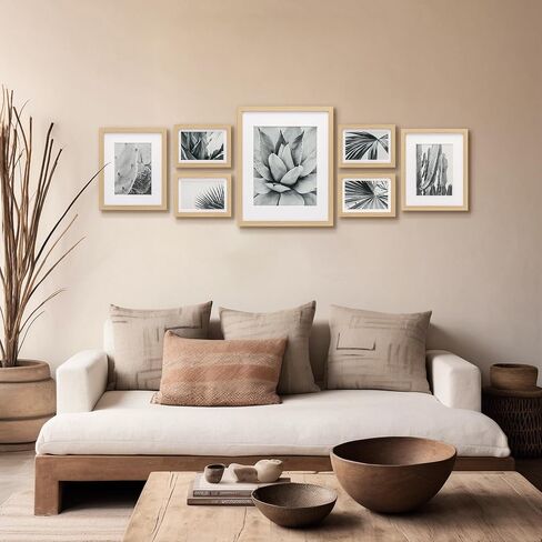 ArtbyHannah 7 Pack Gallery Wall Picture Frames Sets with Decorative Botanical Art Prints for Photo Frame Collages for Home Decoration, Natural Frames, Multiple Sizes One 11x14, Two 8x10, Four 5x7 in Saudi Arabia