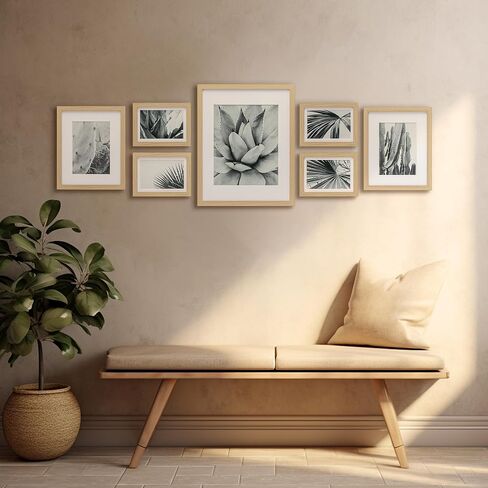 ArtbyHannah 7 Pack Gallery Wall Picture Frames Sets with Decorative Botanical Art Prints for Photo Frame Collages for Home Decoration, Natural Frames, Multiple Sizes One 11x14, Two 8x10, Four 5x7 in Saudi Arabia