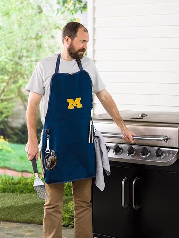 Team Sports America University of Michigan Grilling Apron | Bottle Opener and Insulated Beverage Holder | Adjustable Straps in Saudi Arabia