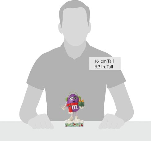 Enesco M&M's by Jim Shore M&M شخصية أرجوانية تحمل تمثال هدية - تمثال حلوى M&M مطلي يدويًا من الراتنج الحجري، تمثال ديكور منزلي لعيد الميلاد، 6.3 بوصة in Saudi Arabia