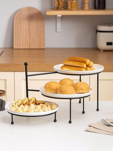 Kanwone 3 Tiered Serving Stand with White Porcelain Plates, Tiered Tray Stand, 10" x 10" Tier Serving Trays with Black Metal Stand for Entertaining, 3 Tier Cupcake Stand, Dessert Stand in Saudi Arabia