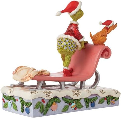 Enesco Dr. Seuss Grinch من Jim Shore Santa Grinch مع تمثال Max Riding on Sleigh، تمثال منحوت لديكور المنزل مصنوع يدويًا من الراتنج الحجري، 6.75 بوصة، متعدد الألوان in Saudi Arabia