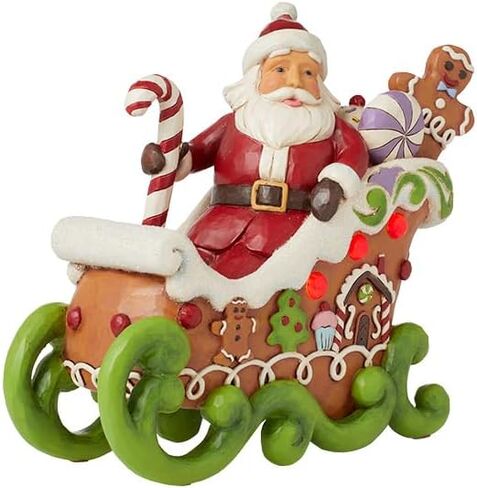Enesco Jim Shore Heartwood Creek Gingerbread Christmas Santa in Sleigh Lit تمثال - تماثيل سانتا قابلة للجمع مرسومة يدويًا من الراتنج الحجري مع أضواء تمثال ديكور منزلي لعيد الميلاد، 6.87 بوصة in Saudi Arabia
