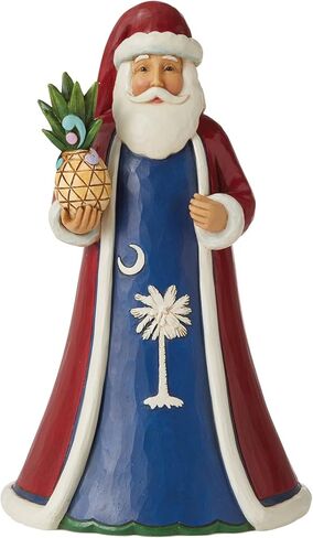 Enesco Jim Shore Heartwood Creek South Carolina Red and Blue Santa Figurine, 7.25 Inch, Multicolor in Saudi Arabia