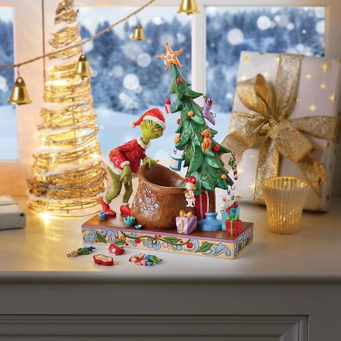 Enesco Dr. Seuss Grinch بواسطة Jim Shore Santa Grinch يقف مع اليدين على تمثال HIPS، تمثال منحوت مصنوع يدويًا من الراتنج الحجري لعيد الميلاد لديكور المنزل، 6.69 بوصة، متعدد الألوان in Saudi Arabia