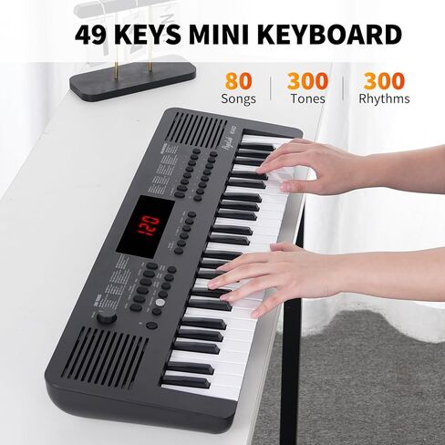 K140 49 Keys Mini Keyboard Piano, Portable Small Electric Keyboard with 80 Songs, 300 Sounds, 300 Rhythms & MIDI Function, Compact Music Keyboard Gift for Kids/Beginners (Black) in Saudi Arabia