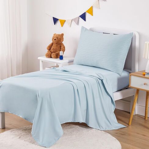 Wake In Cloud - Seersucker Toddler Bedding Set for Boys Girls, 4 Pieces Soft Crib Bed Set Including Comforter, Sheets and Pillowcase, Textured Breathable Soft Microfiber, Light Blue in Saudi Arabia