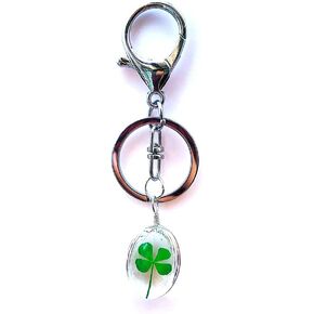 Lovely four leaf clover key chain transparent resin bead pendant with lucky unique charm for ladies key chain in Kuwait