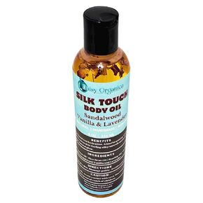 Silk Touch Body Oil - Hydrating & Nourishing. Two variables scent: Sandalwood Vanilla/Lavender & Lychee Pineapple (Sandalwood Vanilla & Lavender)