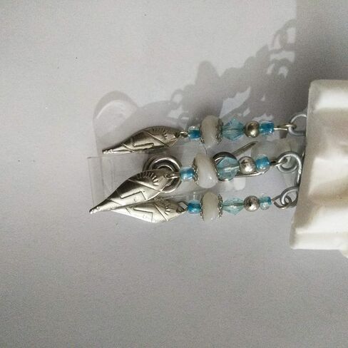 Fairy tale castle badge holder and retractable reel with glass and metal beads in Saudi Arabia