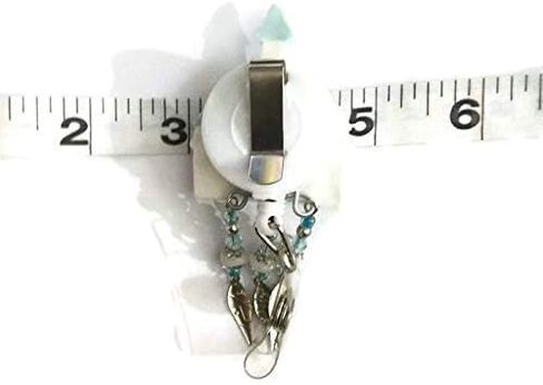 Fairy tale castle badge holder and retractable reel with glass and metal beads in Saudi Arabia