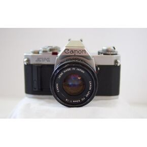 Canon AV-1 35mm SLR Camera with Canon FD Mount Lens, uses both Color & B&W 35MM film. (Renewed) in Kuwait