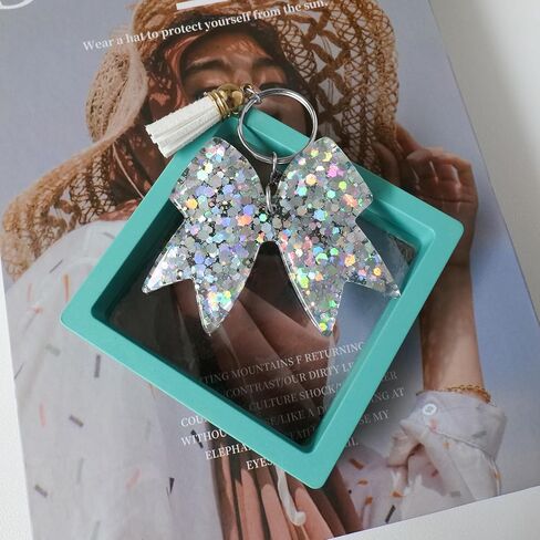 سلسلة مفاتيح على شكل فيونكة لامعة - سلاسل مفاتيح ساحرة على شكل بهجة - إكسسوارات التشجيع للفتيات - هدية مبهجة للمشجعين وأعضاء الفريق - فضي/قطعتين in Kuwait