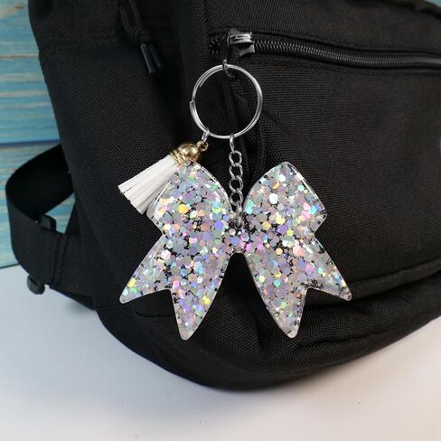 سلسلة مفاتيح على شكل فيونكة لامعة - سلاسل مفاتيح ساحرة على شكل بهجة - إكسسوارات التشجيع للفتيات - هدية مبهجة للمشجعين وأعضاء الفريق - فضي/قطعتين in Kuwait