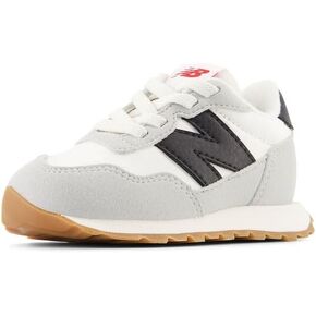New Balance Kids 237 Bungee Sneaker, NB NAVY/VARSITY GOLD, 7.5 M Toddler (1-4 Years)