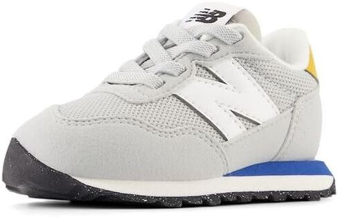 New Balance Kids 237 Bungee Sneaker, NB NAVY/VARSITY GOLD, 7.5 M Toddler (1-4 Years) in Saudi Arabia