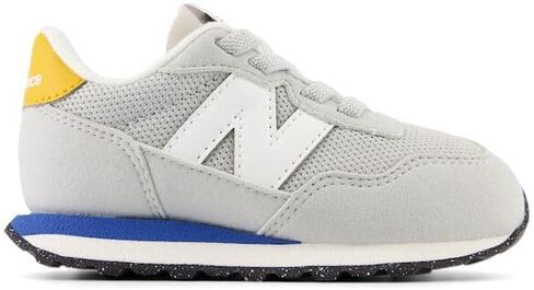 New Balance Kids 237 Bungee Sneaker, NB NAVY/VARSITY GOLD, 7.5 M Toddler (1-4 Years) in Saudi Arabia