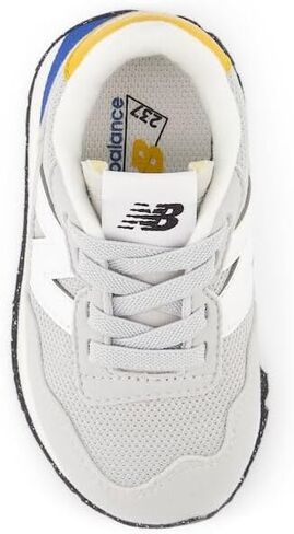 New Balance Kids 237 Bungee Sneaker, NB NAVY/VARSITY GOLD, 7.5 M Toddler (1-4 Years) in Saudi Arabia