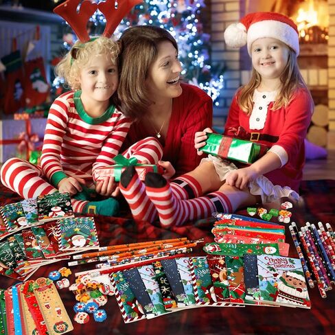 218 Pcs Christmas Stationery Set for Kids Includes Pencil sharpener Eraser Ruler Stamp Mini Notebook Treat Bags Stickers, Xmas Party Themed Classroom Gift Exchange School Games Prizes Carnival Events in Saudi Arabia