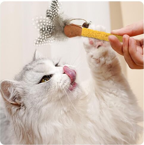 Andiker 3Pcs Cat Chew Sticks, Catnip Chew Toys with Feather Funny Cat Feather Toys Silvervine Matatabi Sticks for Cats Teeth Cleaning Chewing Relax (Yellow+Green+Grey) in Saudi Arabia