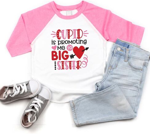 Bump and Beyond Designs Girls تمت ترقيتها إلى قميص الأخت الكبرى لعيد الحب للأطفال الصغار راجلان in Kuwait