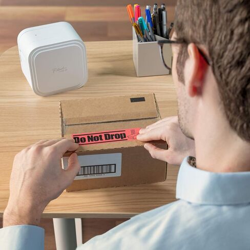 Brother P-Touch TZe-M65 White Print on Matte Clear Label Tape 1.4" (36mm) Wide x 26.2’ (8m) Long in Kuwait