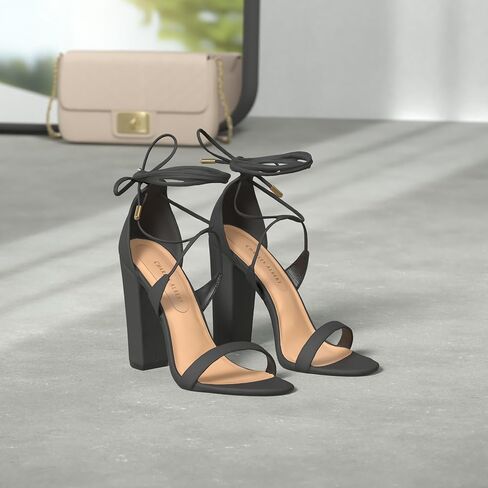 صندل نسائي من Charles Albert ذو أربطة متقاطعة وحزام متقاطع وكعب عالٍ ومفتوح عند الأصابع in Kuwait