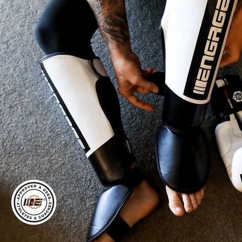 إشراك حراس الساق E-Series | وسادة ساق واقية لفنون القتال المختلطة، Muay Thai، Kickboxing، Taekwondo | مناسبة للأطفال والكبار in Kuwait