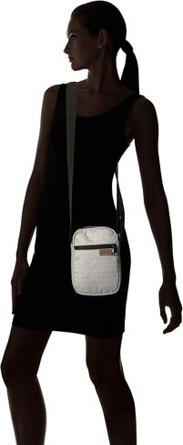 JanSport Weekender FX Mini Bag - Crossbody Pack | Black Mix Wavy Twill in Saudi Arabia