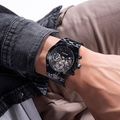 GUESS Men's Sport Crystal Multifunction 44mm Watch – Black Dial Gold-Tone Stainless Steel Case with Black Silicone Strap in Saudi Arabia