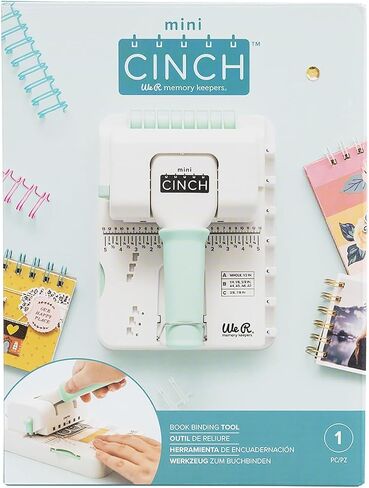 آلة تجليد الكتب We R Memory Keepers Mini Cinch، بيضاء، أداة صغيرة، تصميم سهل الاستخدام مع مسطرة، متوافقة مع الأسلاك أو الملفات الحلزونية، اصنع كتبًا احترافية وأجهزة الكمبيوتر المحمولة والتقويمات والمزيد in Kuwait